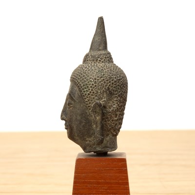 Lot 421 - Small bronze model of a Buddha's head Thailand...