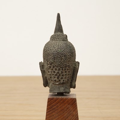 Lot 421 - Small bronze model of a Buddha's head Thailand...