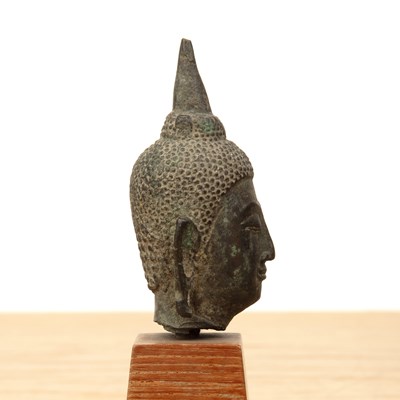 Lot 421 - Small bronze model of a Buddha's head Thailand...