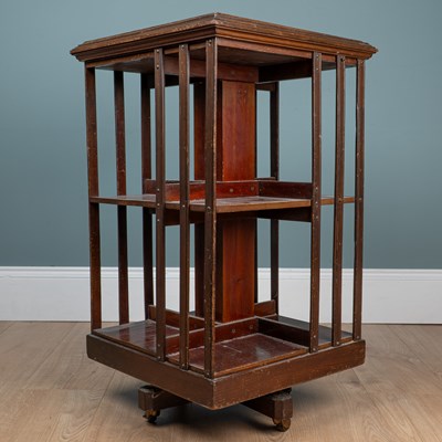 Lot 442 - An Edwardian two-tier rotating bookcase