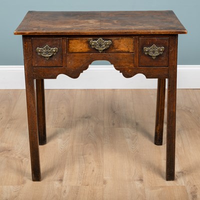Lot 1094 - A 19th century walnut lowboy