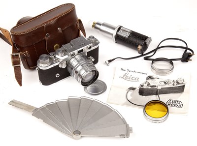 Lot 311 - A Leica IIIc 1949 camera 470435 with a Leitz...