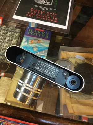Lot 311 - A Leica IIIc 1949 camera 470435 with a Leitz...