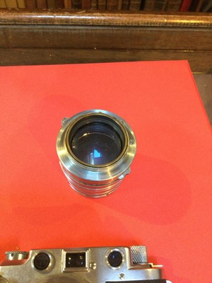Lot 311 - A Leica IIIc 1949 camera 470435 with a Leitz...