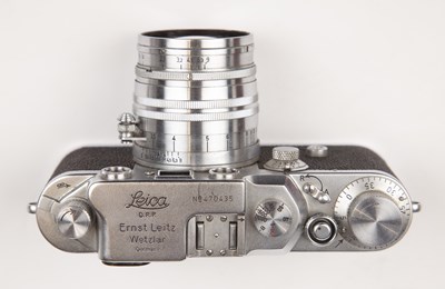Lot 311 - A Leica IIIc 1949 camera 470435 with a Leitz...