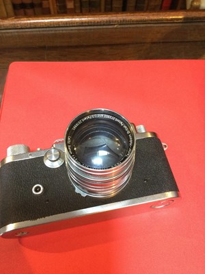 Lot 311 - A Leica IIIc 1949 camera 470435 with a Leitz...