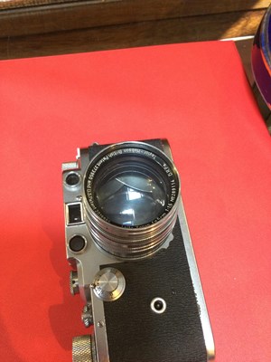 Lot 311 - A Leica IIIc 1949 camera 470435 with a Leitz...