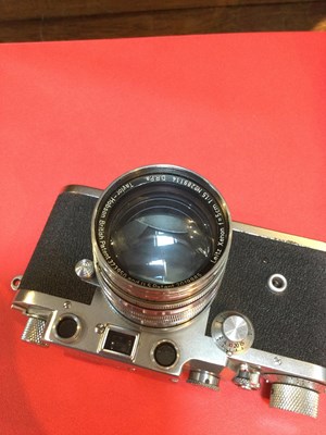 Lot 311 - A Leica IIIc 1949 camera 470435 with a Leitz...