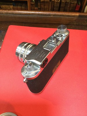 Lot 311 - A Leica IIIc 1949 camera 470435 with a Leitz...