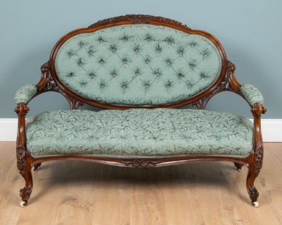 Lot 75 - A Victorian walnut-framed sofa