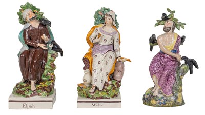 Lot 57 - A group of three early 19th century Staffordshire figures