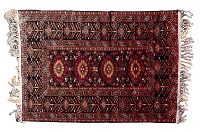 Lot 1288 - A late 20th century hand-woven silk and wool Aghan Baluch rug