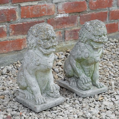 Lot 1368 - A pair of cast reconstituted stone dogs of fo