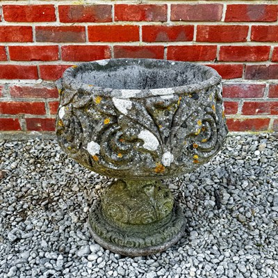 Lot 1492 - A cast reconstituted stone garden urn