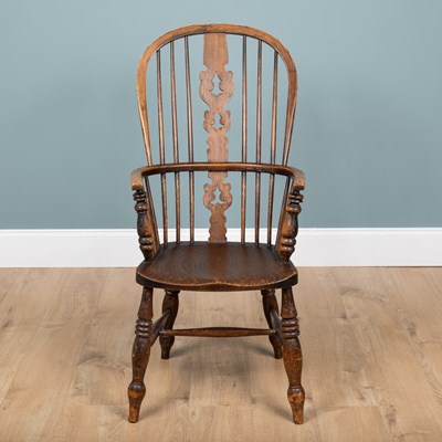 Lot 1203 - An early 20th century elm-seated Windsor armchair