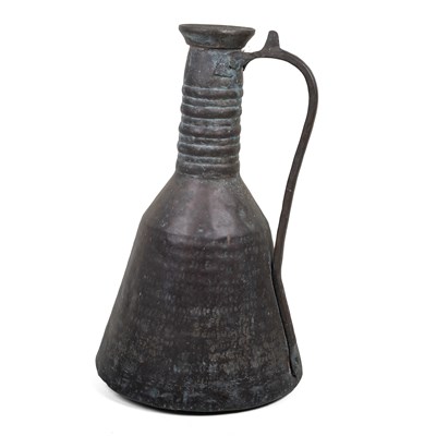 Lot 256 - A 20th century Middle Eastern copper water carrier