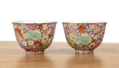 Lot 81A - Pair of millefleur cups Chinese well painted...