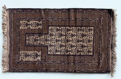 Lot 1267 - An early 20th century Afghan Baluch-style prayer mat