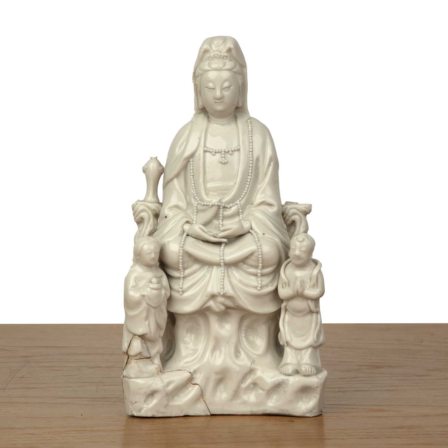 Lot 452 - Blanc de chine figure of Guanyin on a rockwork...