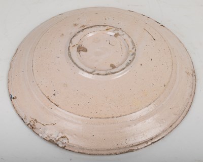 Lot 1068 - An 18th century English Delft charger