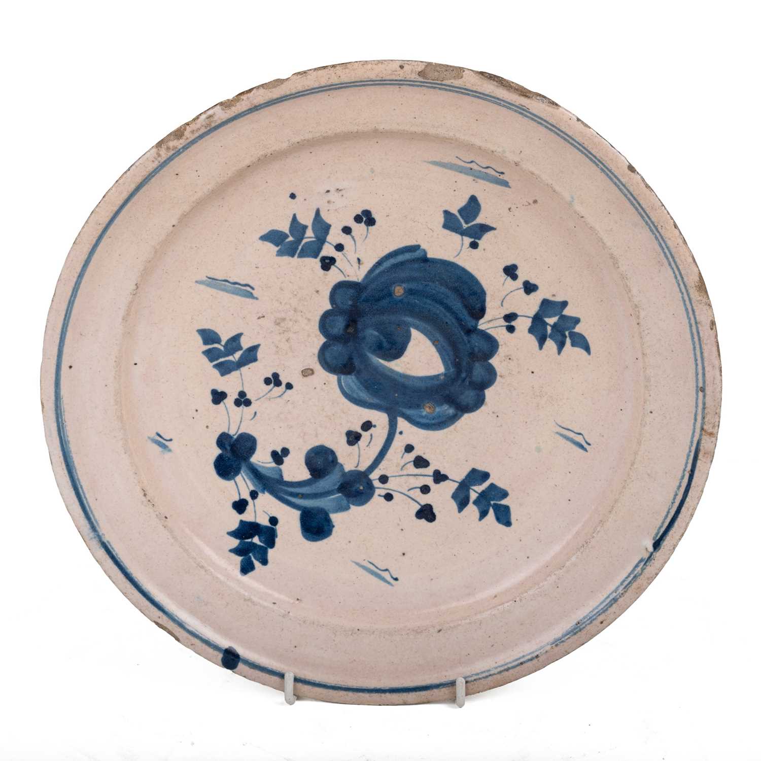 Lot 1068 - An 18th century English Delft charger