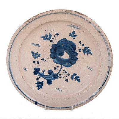 Lot 1068 - An 18th century English Delft charger