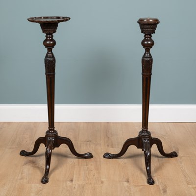 Lot 380 - A pair of mahogany torchère stands