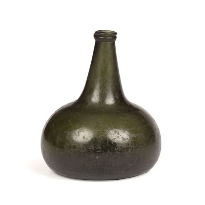 Lot 202 - An early 18th century English green glass...