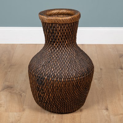 Lot 285 - A Japanese woven basket or flower vase