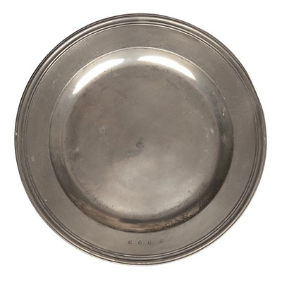 Lot 288 - An English pewter multiple reeded charger by...