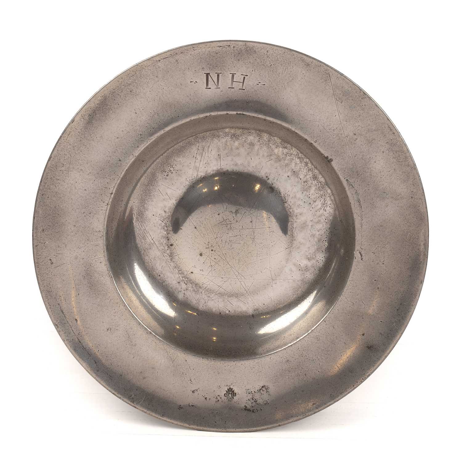 Lot 289 - A German Pewter broad rim ‘bumpy bottom’ dish...