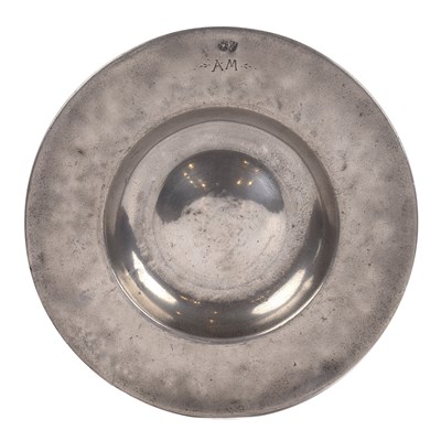 Lot 290 - German Pewter broad rim ‘bumpy bottom’ dish by...