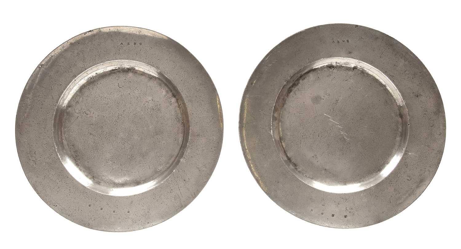 Lot 292 - A pair of pewter broad rim chargers, by Thomas...