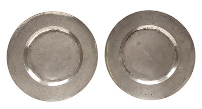 Lot 292 - A pair of pewter broad rim chargers, by Thomas...