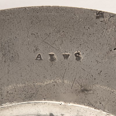 Lot 292 - A pair of pewter broad rim chargers, by Thomas...