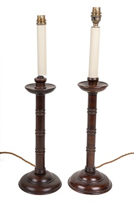 Lot 388 - A near pair of turned wooden table lamps