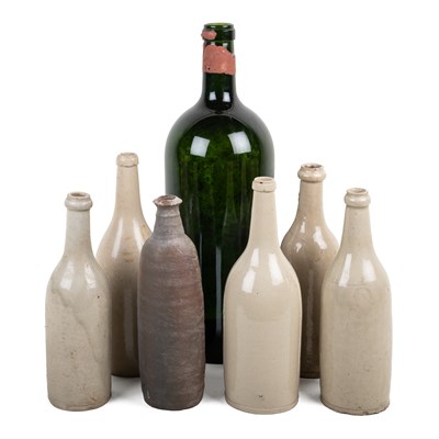 Lot 1227 - A collection of six late 19th or early 20th century ceramic French cider bottles