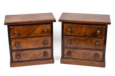 Lot 1114 - A pair of oak and walnut apprentice chests of drawers