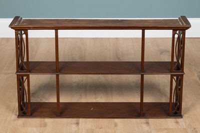 Lot 1149 - An early 20th century mahogany set of hanging shelves