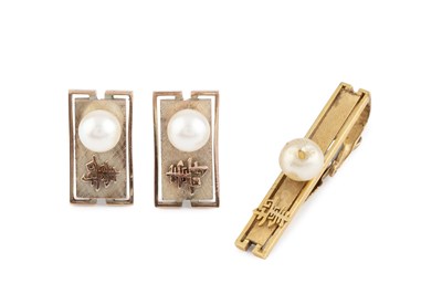 Lot 13 - A pair of cultured pearl set cufflinks, with...