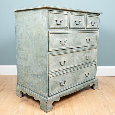Lot 247 - A blue scumble decorated chest of drawers