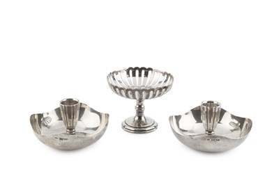 Lot A pair of silver dished candle holders, of...