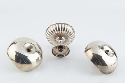 Lot 180 - A pair of silver dished candle holders, of...