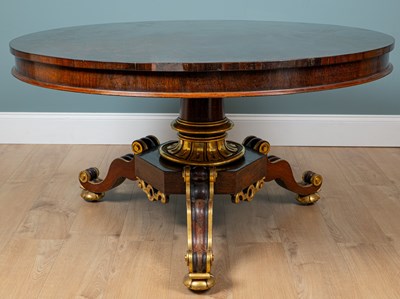 Lot 300 - A circular mahogany centre table with a turned...