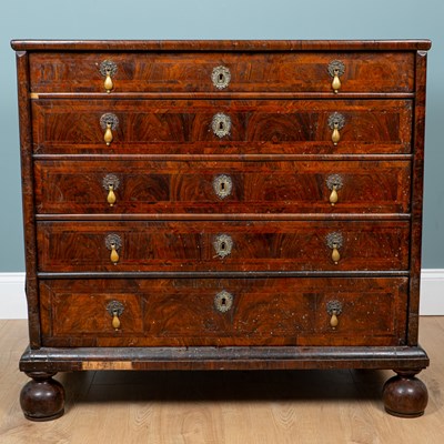 Lot 51 - An early 18th century walnut chest of drawers