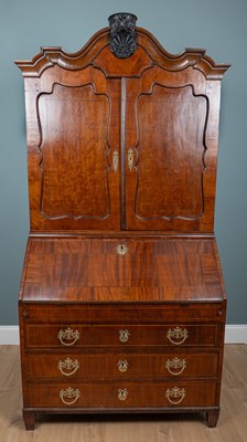 Lot 73 - A Dutch 18th century red cherrywood and oak bureau cabinet