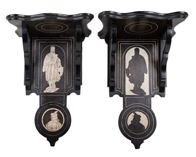 Lot 236 - A pair of ebonised brackets