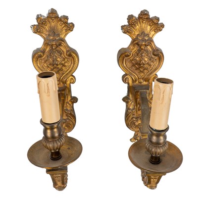 Lot 65 - A pair of decorative gilt brass wall lights