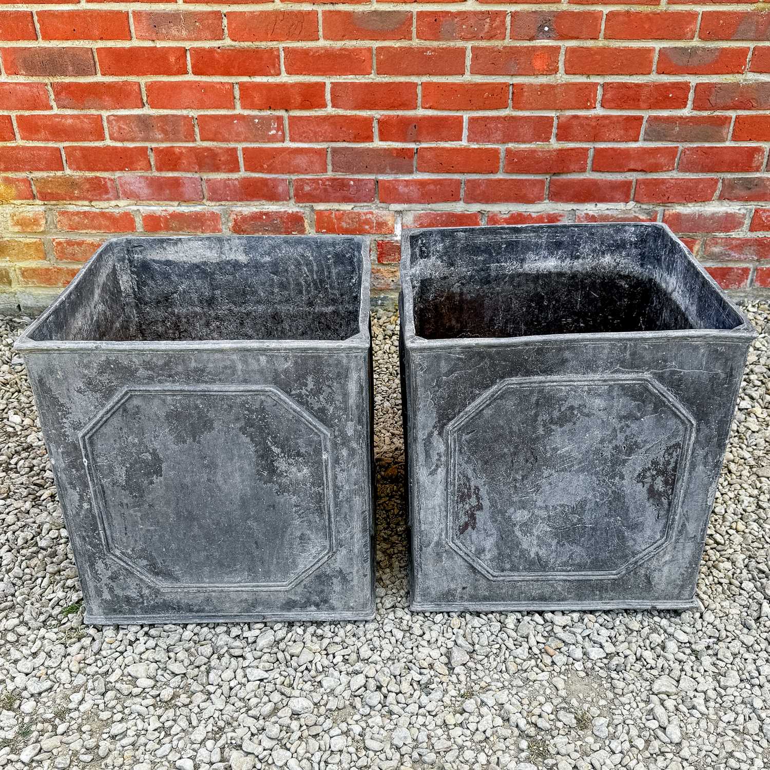 Lot 1355 - A pair of medium sized lead planters