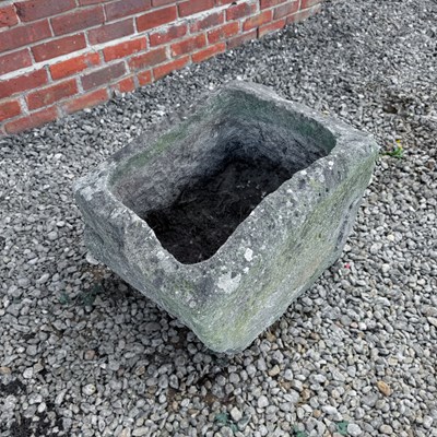Lot 1448 - A rustic carved stone trough